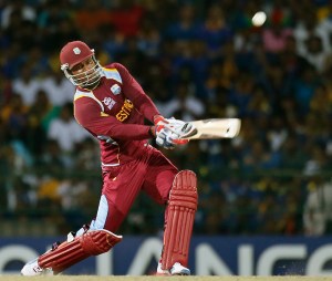 Hitting out...Marlon Samuels blasts his way to a match winning 78 in the World T20 final. 